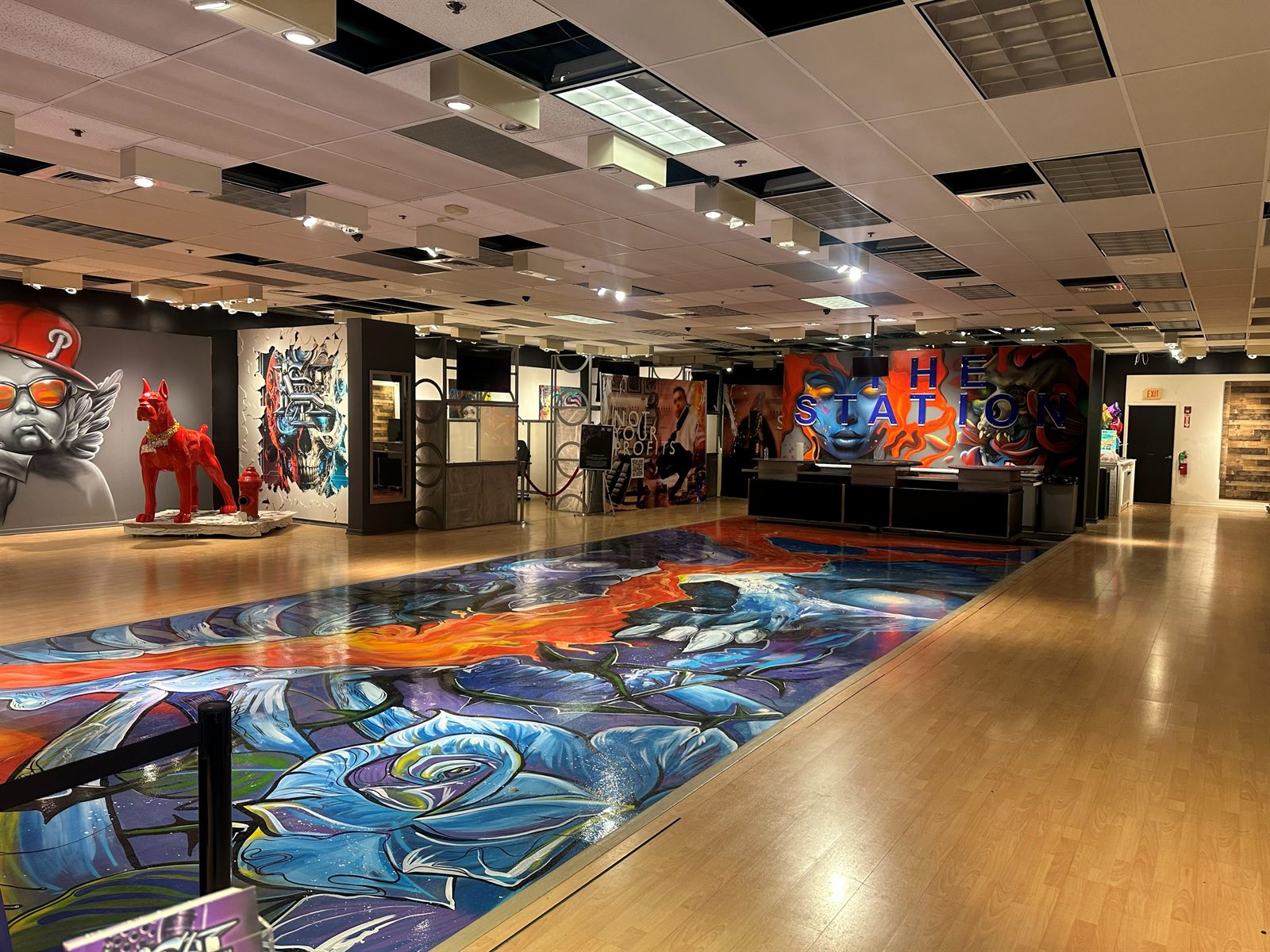 The Station Philadelphia — studio floor with murals and workstations